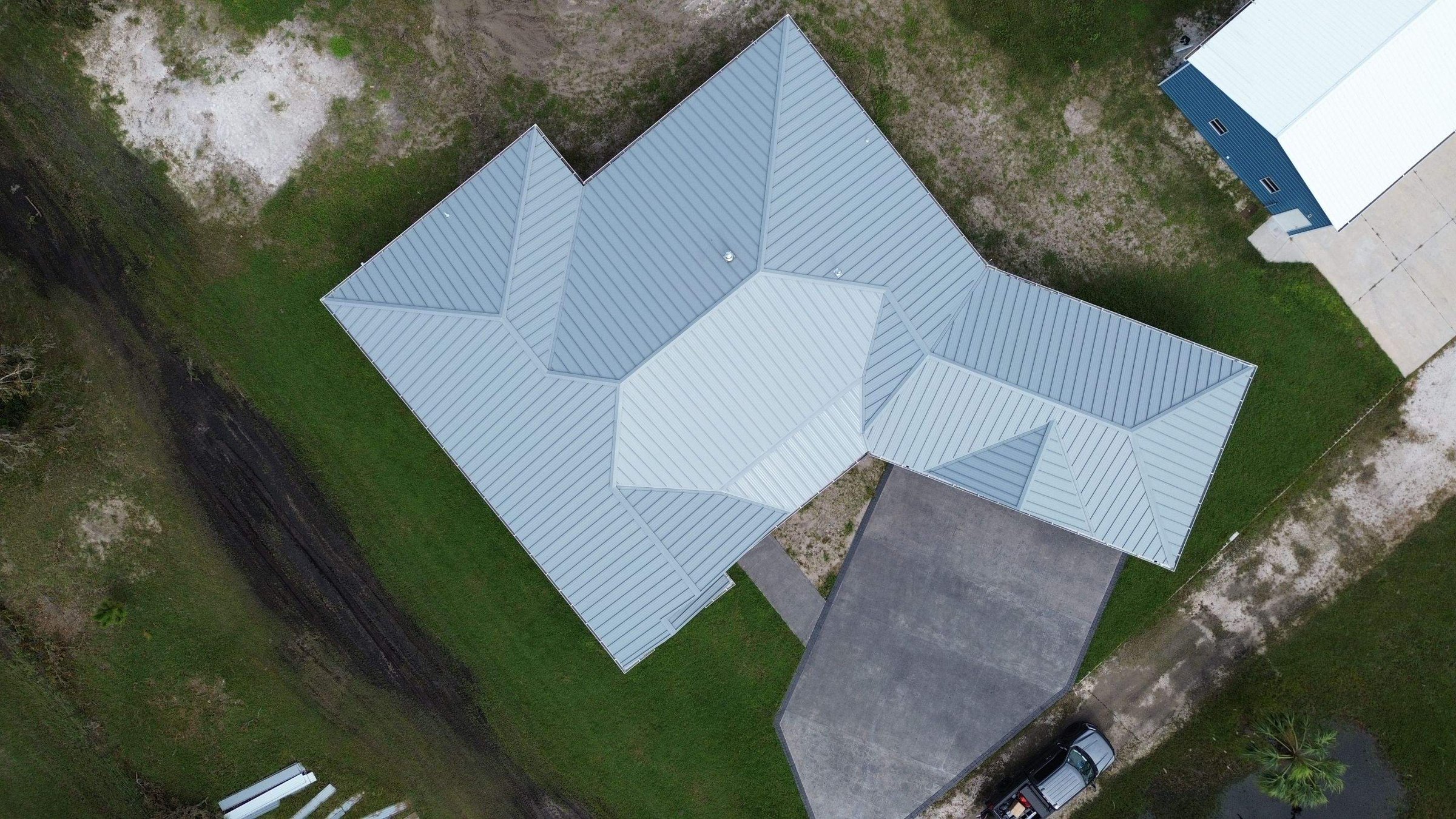 Condo shingle roof before and after replacement in Tampa Bay