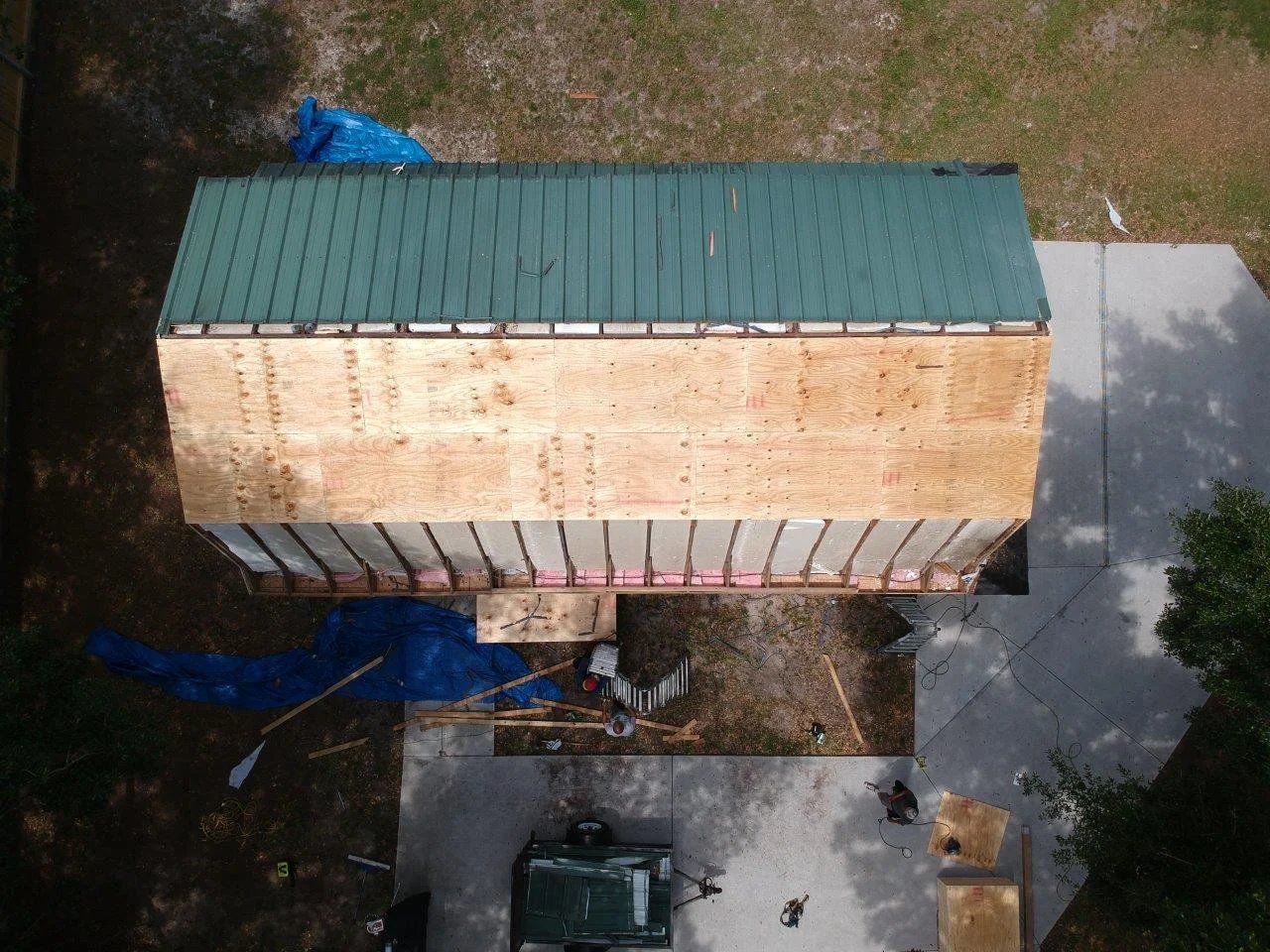 Aerial view of roof replacement in progress — Florida Shelter Roofing crew