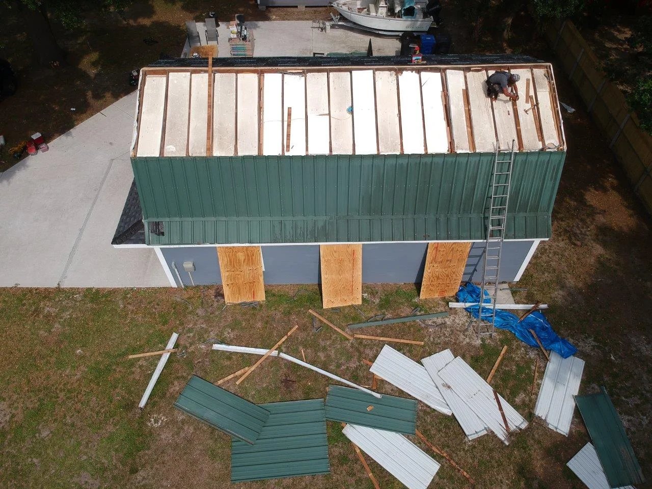 Drone aerial of finished residential roofing project — Tampa Bay